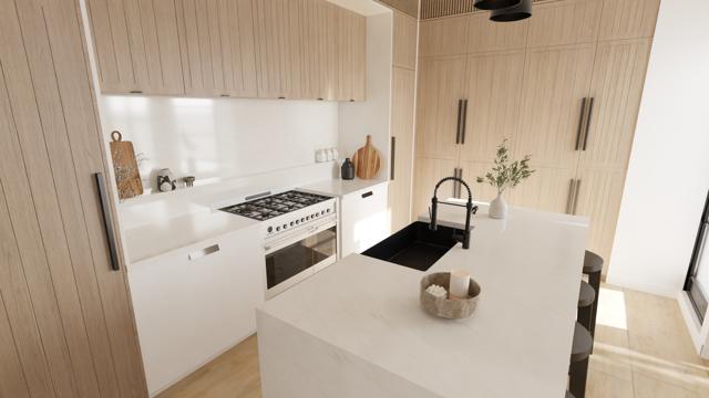 Verticalidad y Contraste en Cocina Minimalista