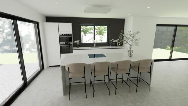 Cocina minimalista con isla central y ventanales panorámicos